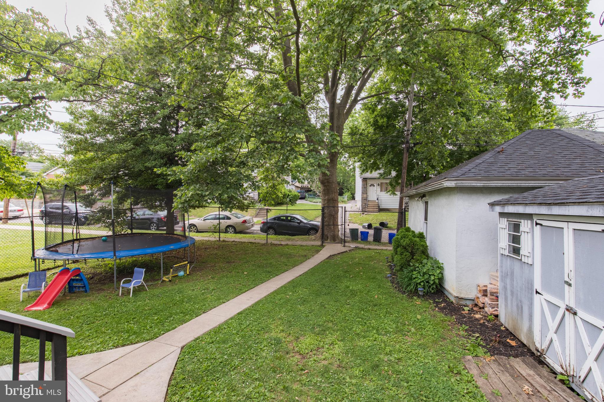 312 South State Road Upper Darby, PA 19082 - Photo 32 of 37 a view of a house with a yard and sitting area