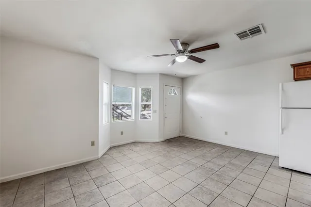a view of an empty room with window