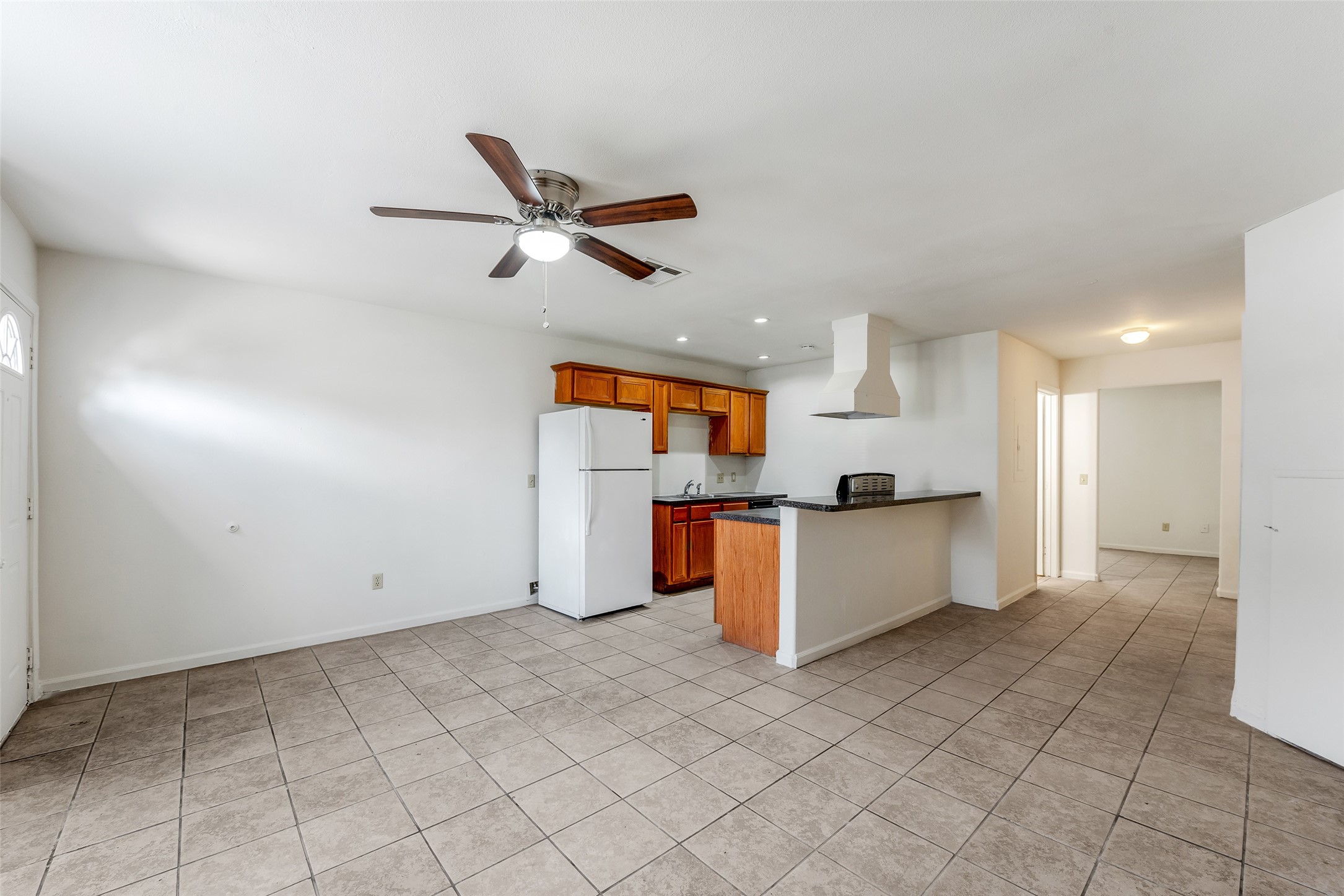 3238 Alabama Street, Unit 2 Houston, TX 77004 - Photo 5 of 15 a view of kitchen with stainless steel appliances cabinets and window