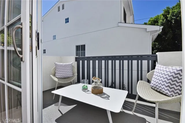 a view of a table and chairs in patio
