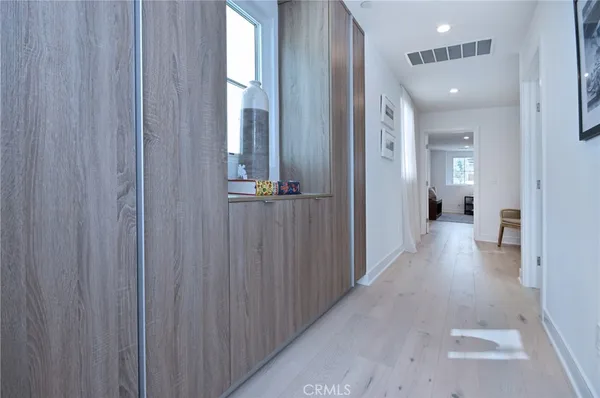 a view of a hallway with closet