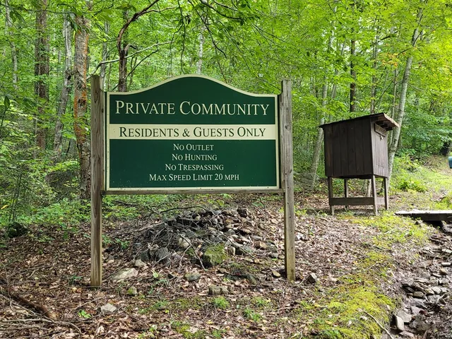 a sign on the side of the road