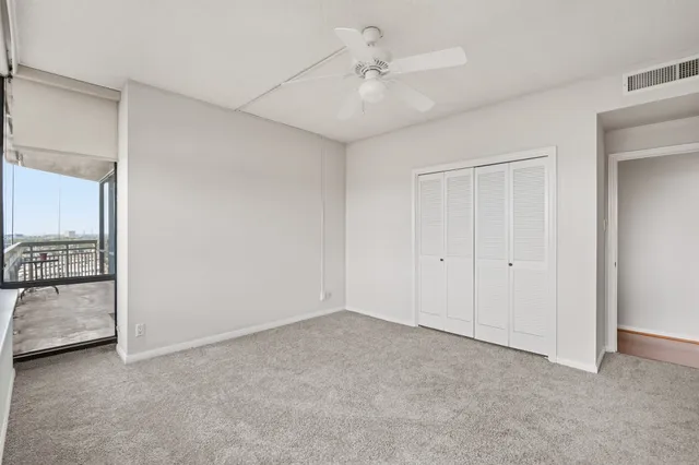 a large kitchen with a large window