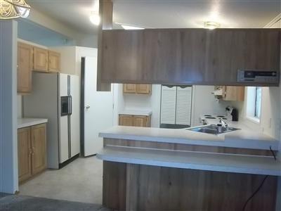 255 Colver Road, Unit 93 Talent, OR 97540 - Photo 6 of 15 kitchen has wonderful skylight and comes