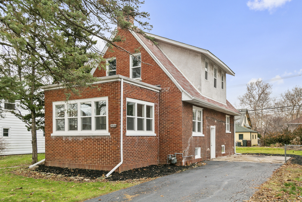 1914 Evergreen Road Homewood, IL 60430 - Photo 1 of 18 a front view of a house with a yard