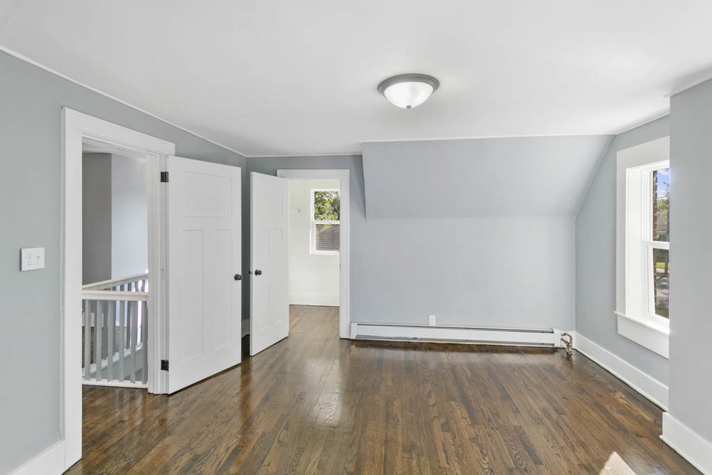 1914 Evergreen Road Homewood, IL 60430 - Photo 13 of 18 an empty room with wooden floor and windows