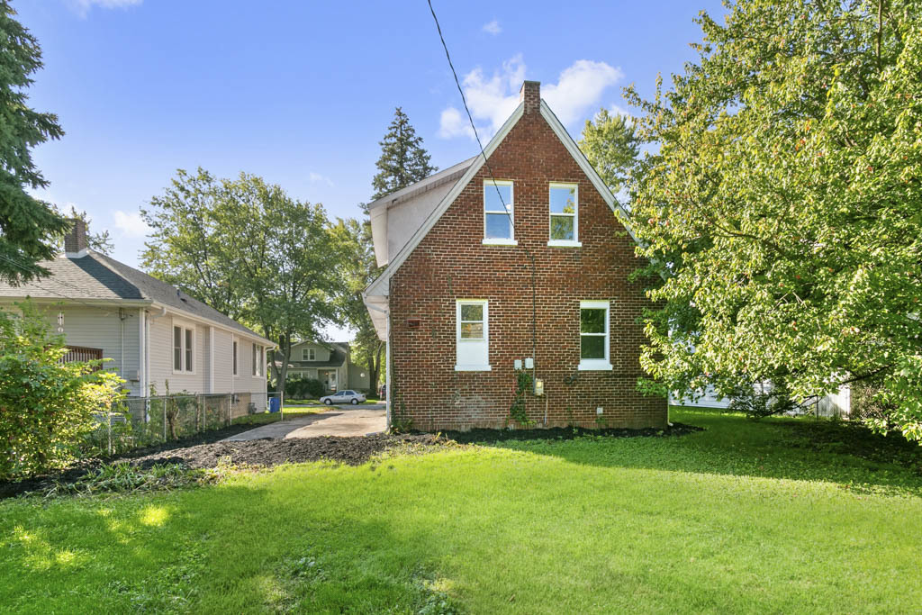1914 Evergreen Road Homewood, IL 60430 - Photo 18 of 18 a front view of house with a garden