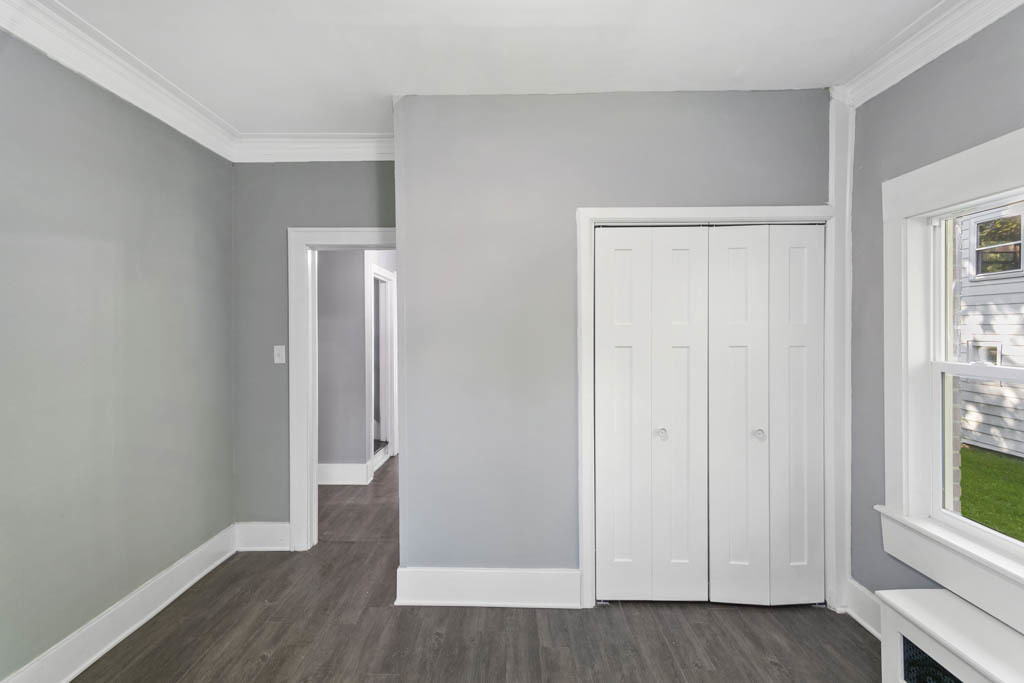 1914 Evergreen Road Homewood, IL 60430 - Photo 6 of 18 an empty room with wooden floor and windows