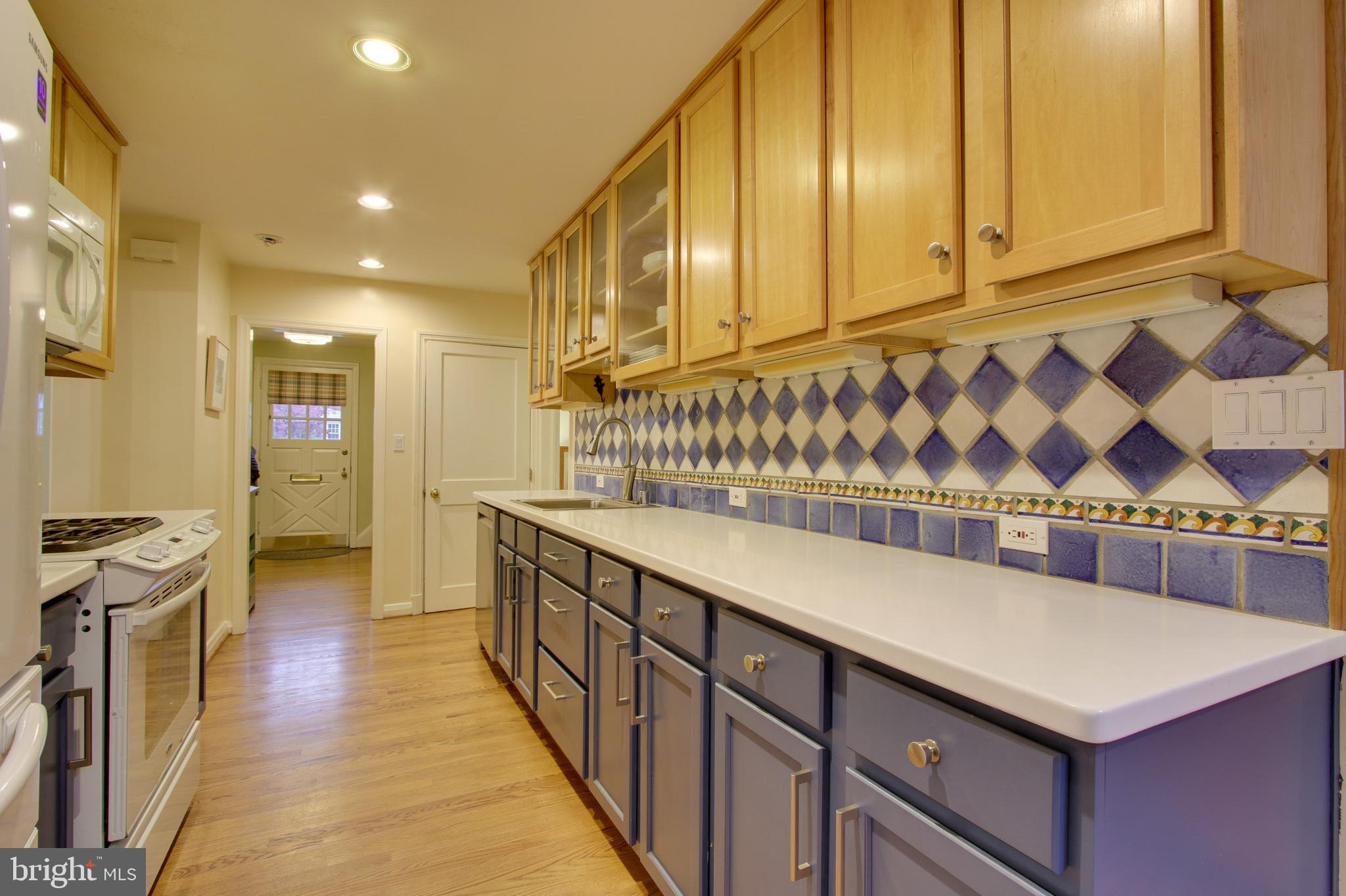 417 Alabama Road Baltimore, MD 21204 - Photo 14 of 47 Kitchen floor has been replaced with hard wood.
