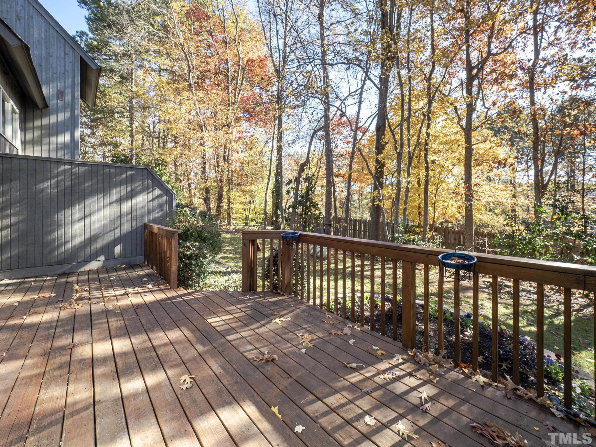 4349 Sunscape Lane Raleigh, NC 27613 - Photo 17 of 28 a view of a backyard with wooden floor