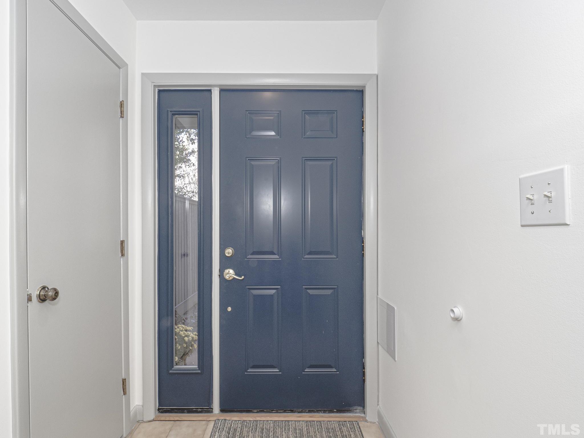 4349 Sunscape Lane Raleigh, NC 27613 - Photo 6 of 28 a bathroom with a glass shower door