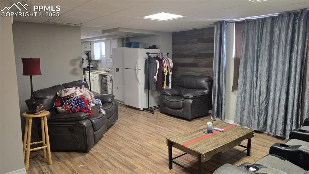414 Seventh Street Hugo, CO 80821 - Photo 19 of 30 a living room with furniture and a flat screen tv