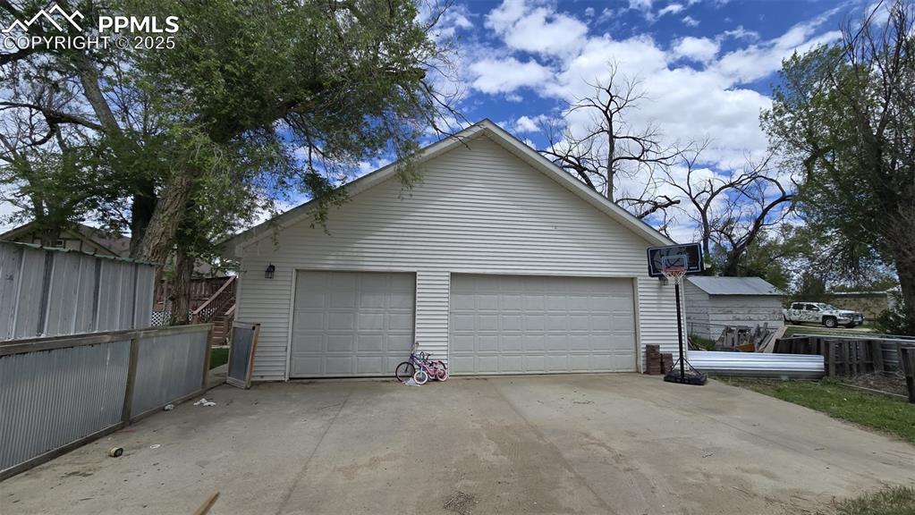 414 Seventh Street Hugo, CO 80821 - Photo 27 of 30 a view of garage and yard