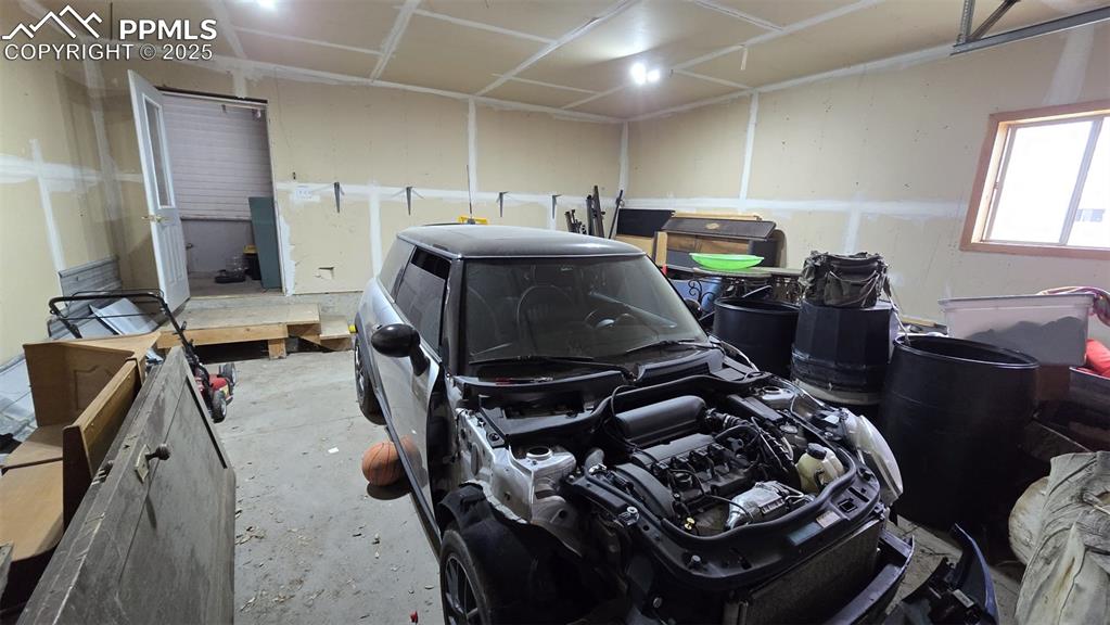 414 Seventh Street Hugo, CO 80821 - Photo 30 of 30 a bedroom with furniture and a window