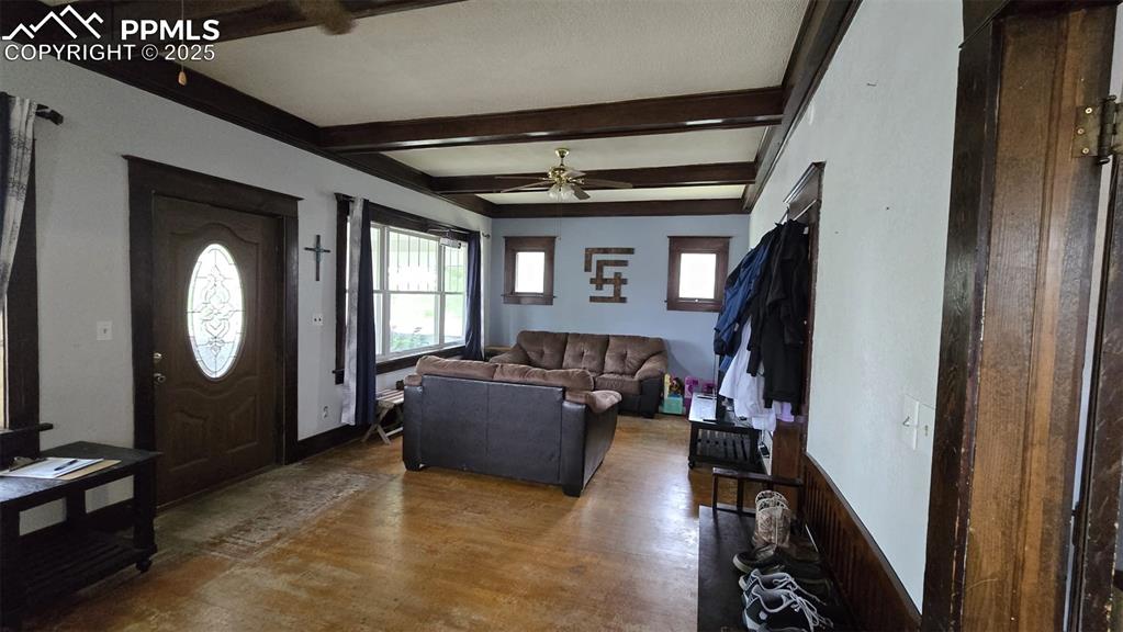 414 Seventh Street Hugo, CO 80821 - Photo 4 of 30 a living room with furniture and a flat screen tv