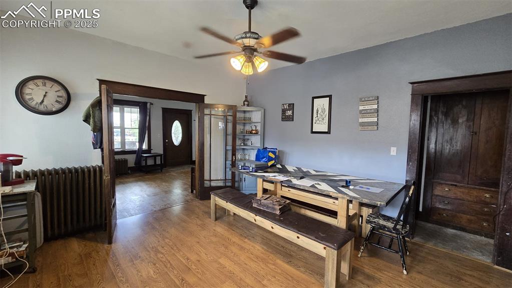 414 Seventh Street Hugo, CO 80821 - Photo 6 of 30 a living room with furniture a clock on wall and a window