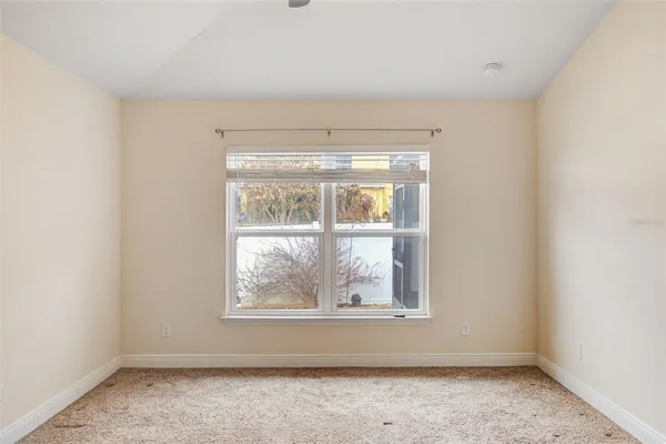 an empty room with a window