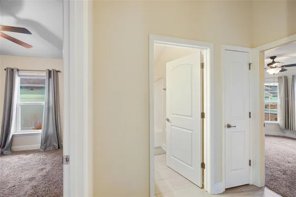 a view of a bathroom from the hallway