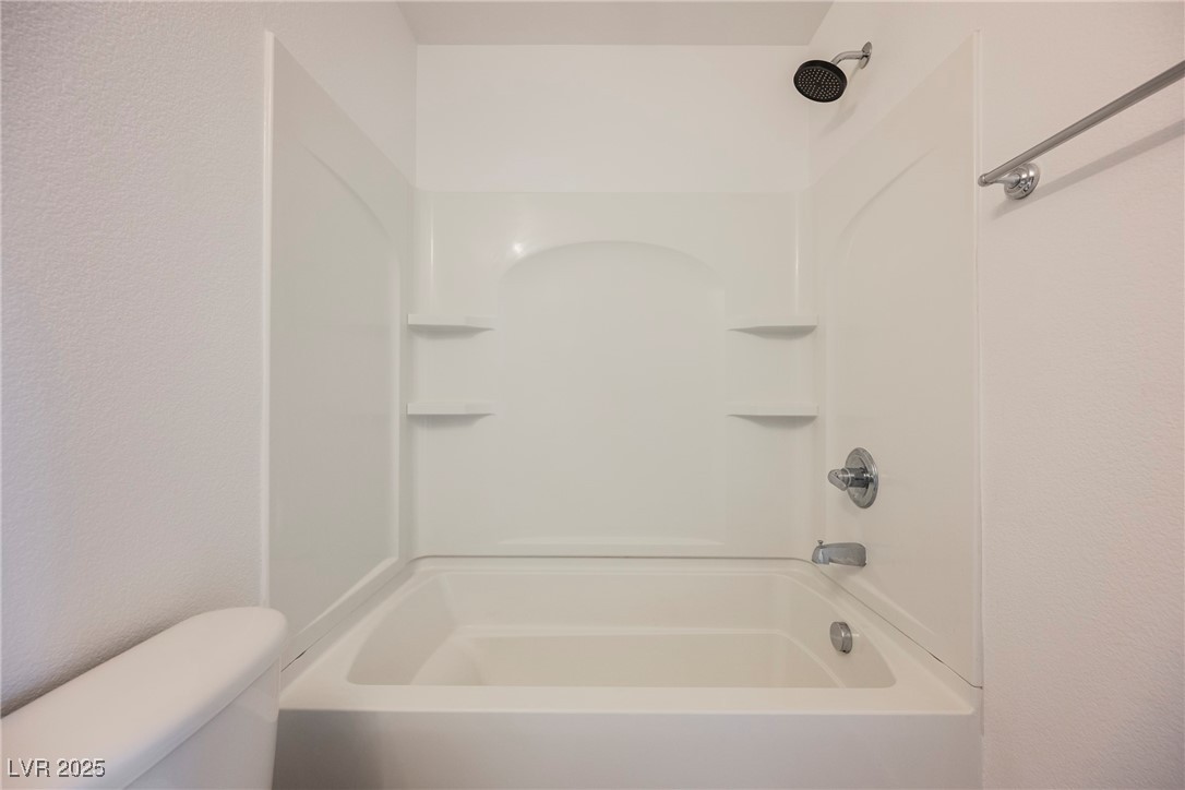 1161 Gecko Road Henderson, NV 89002 - Photo 35 of 54 Bathroom featuring toilet and shower / tub combination