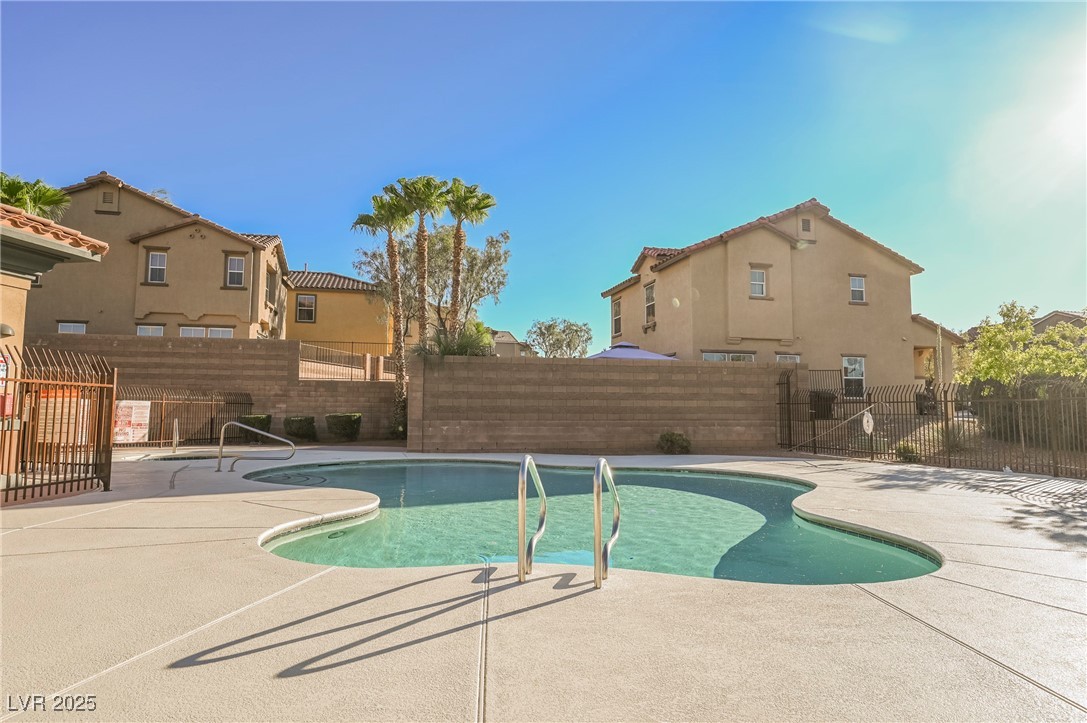 1161 Gecko Road Henderson, NV 89002 - Photo 52 of 54 View of swimming pool featuring a fenced backyard and a patio area
