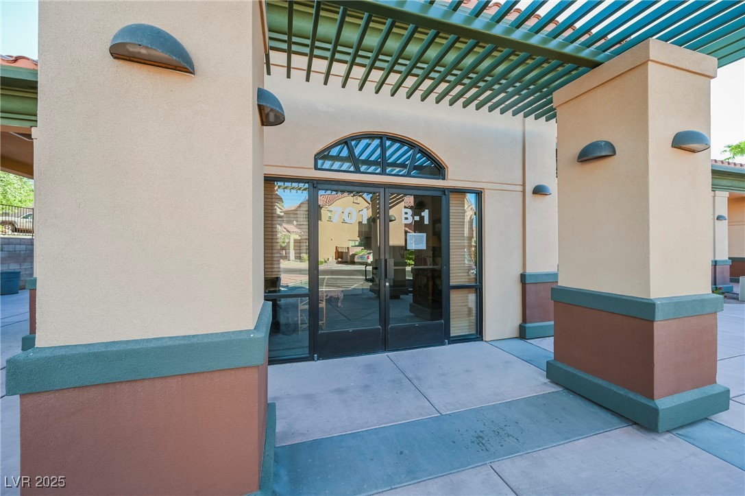 1161 Gecko Road Henderson, NV 89002 - Photo 53 of 54 Property entrance featuring stucco siding
