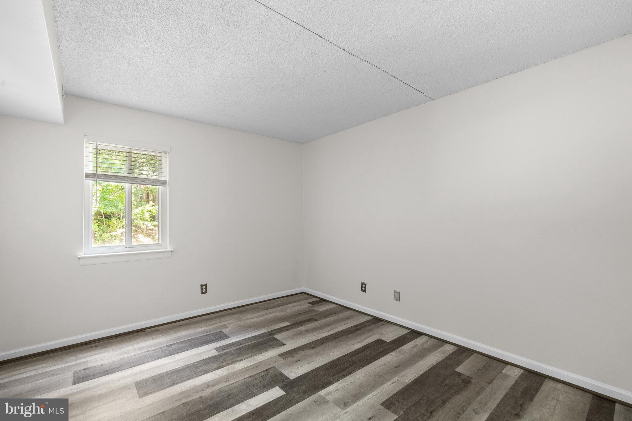 11835 Shire Court, Unit 12C Reston, VA 20191 - Photo 19 of 28 a view of a room that has a window