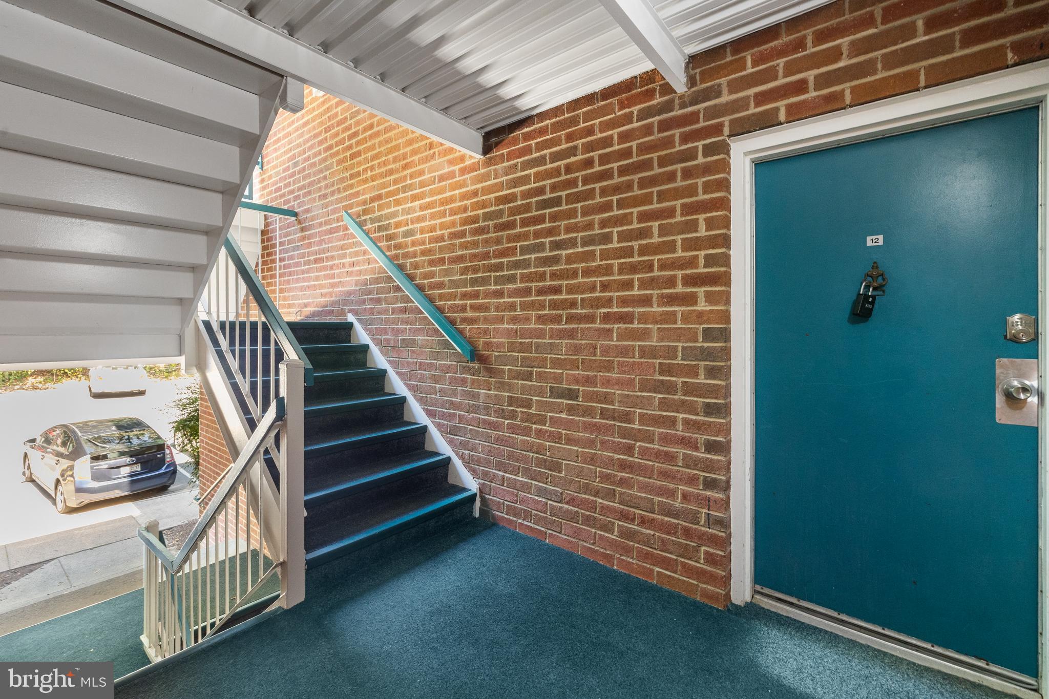 11835 Shire Court, Unit 12C Reston, VA 20191 - Photo 22 of 28 a view of entryway with wooden floor