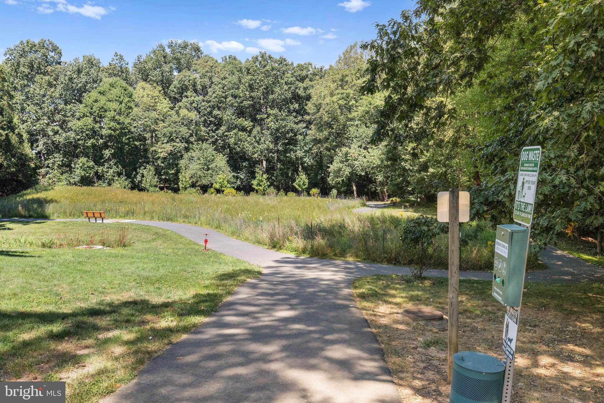 11835 Shire Court, Unit 12C Reston, VA 20191 - Photo 25 of 28 a view of a field with a tree