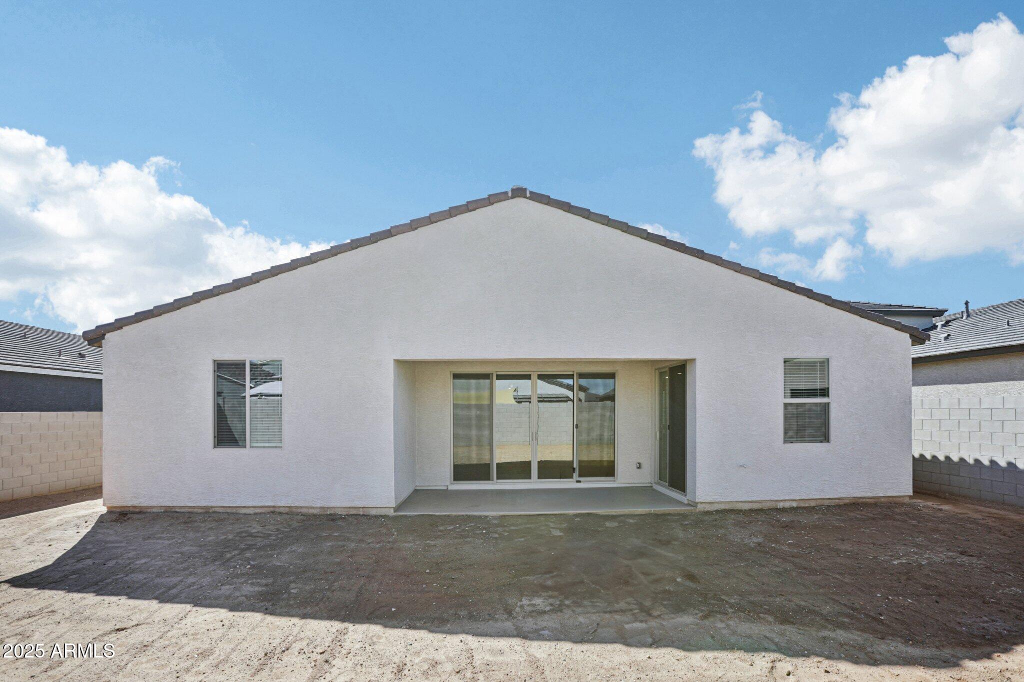 15722 West Brown Street Waddell, AZ 85355 - Photo 42 of 61 a front view of a house with a yard