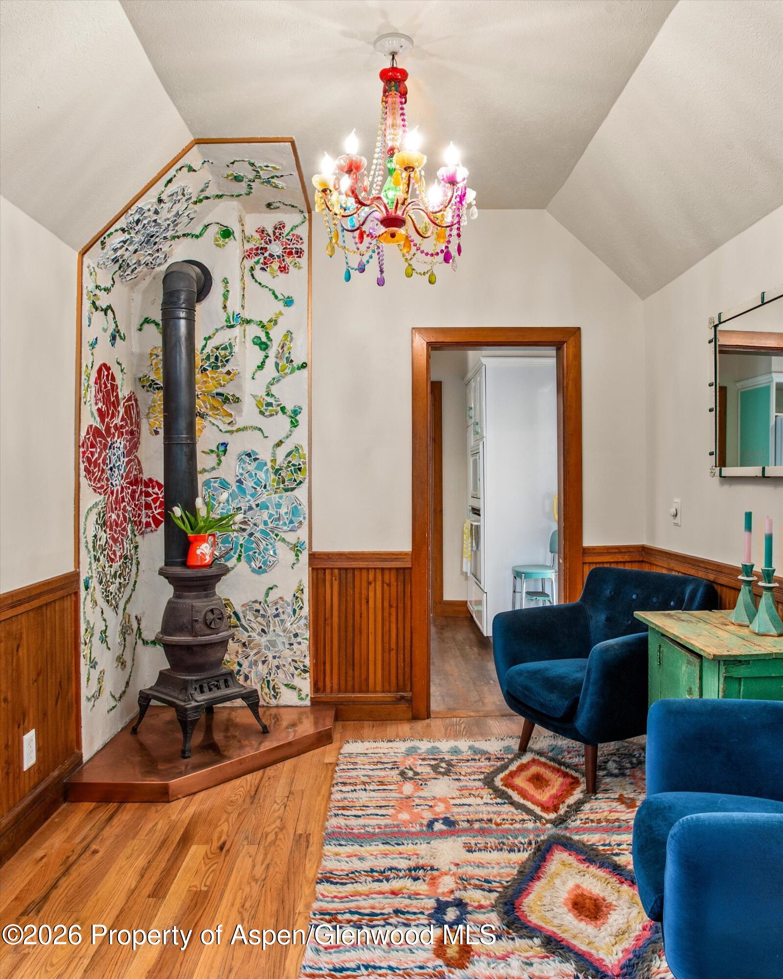 244 Redstone Boulevard Redstone, CO 81623 - Photo 17 of 55 a living room with furniture and a chandelier