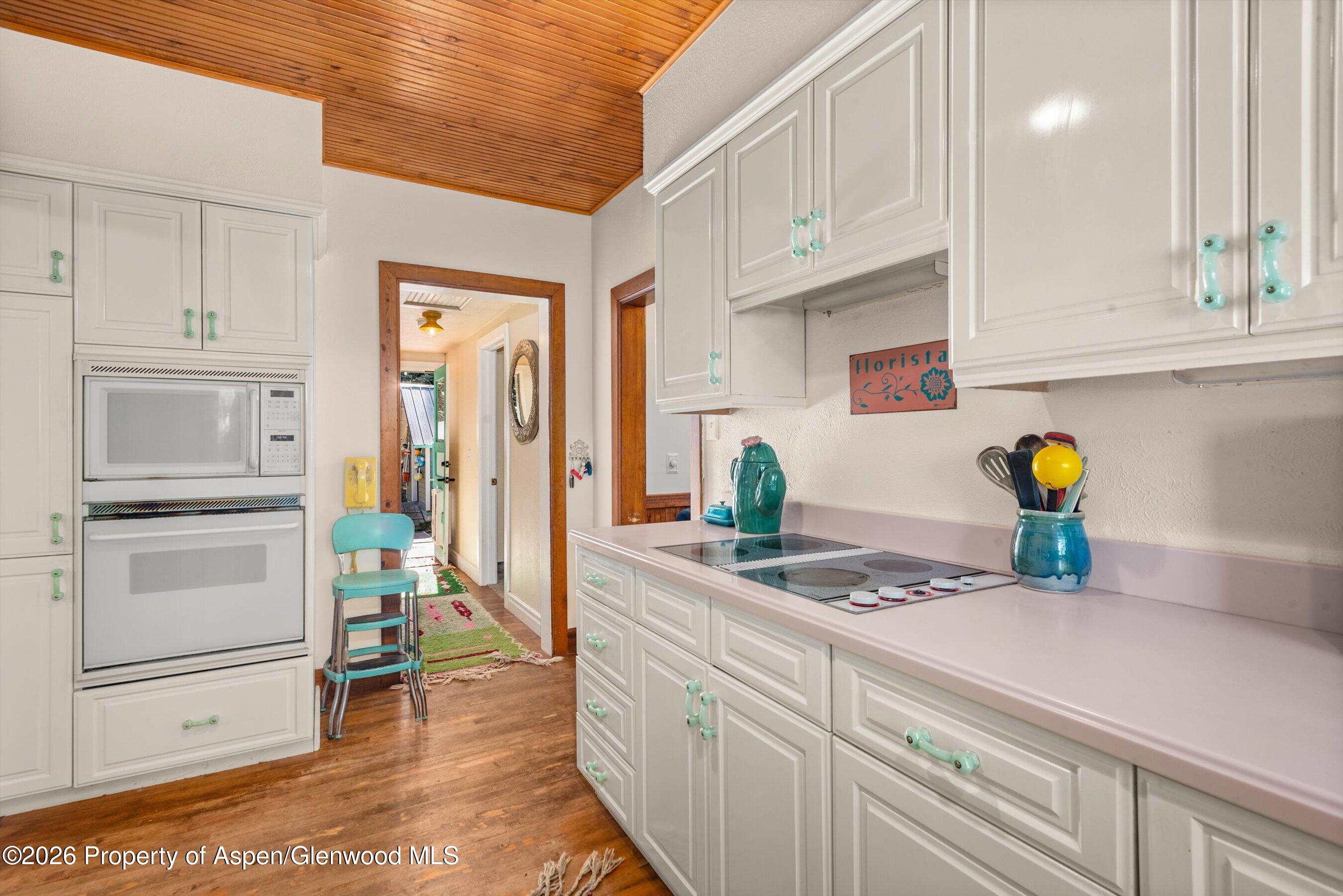 244 Redstone Boulevard Redstone, CO 81623 - Photo 23 of 55 a kitchen with stainless steel appliances granite countertop a refrigerator and a stove