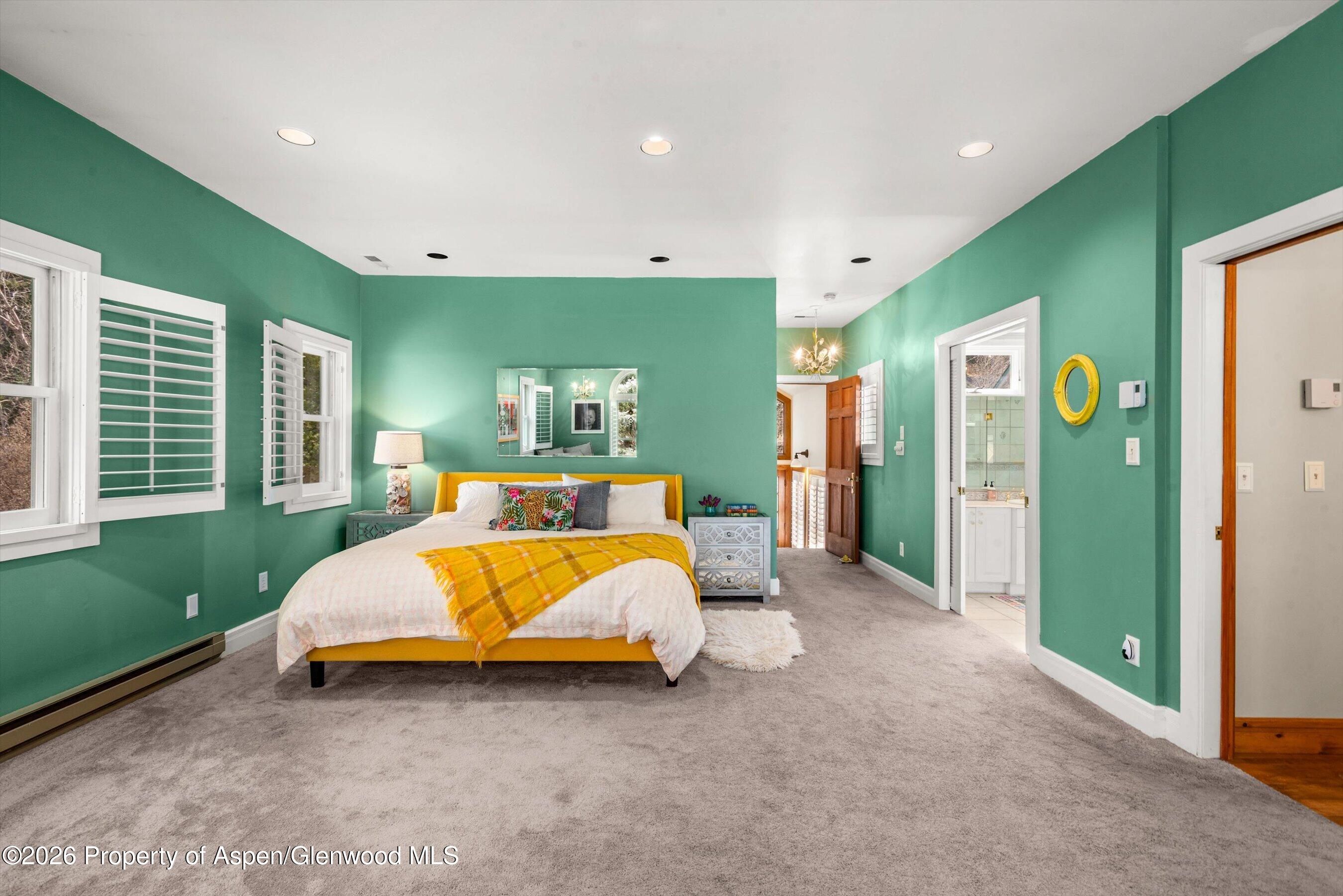 244 Redstone Boulevard Redstone, CO 81623 - Photo 26 of 55 a bed room with a bed and a window