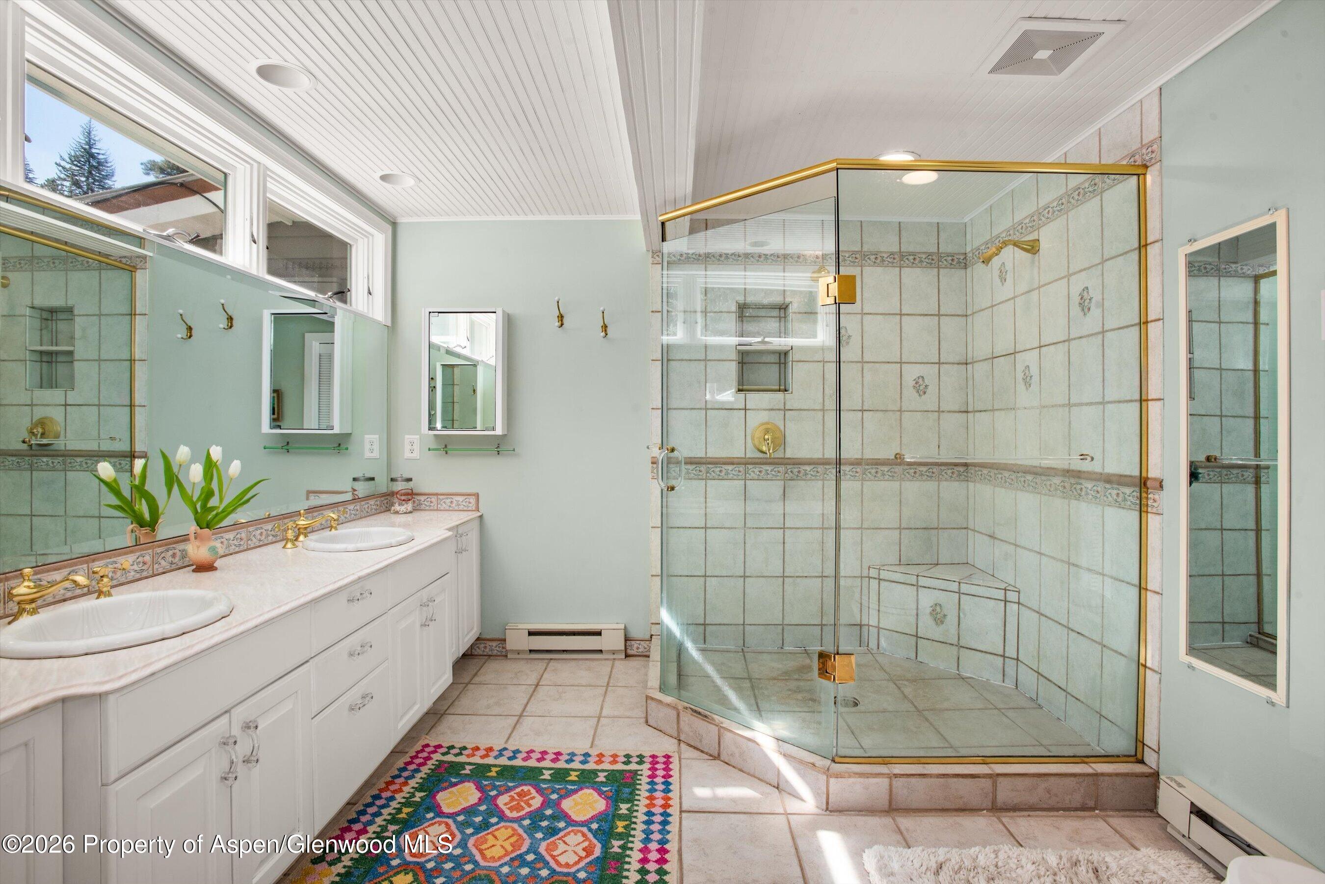 244 Redstone Boulevard Redstone, CO 81623 - Photo 29 of 55 a bathroom with a tub sink and shower