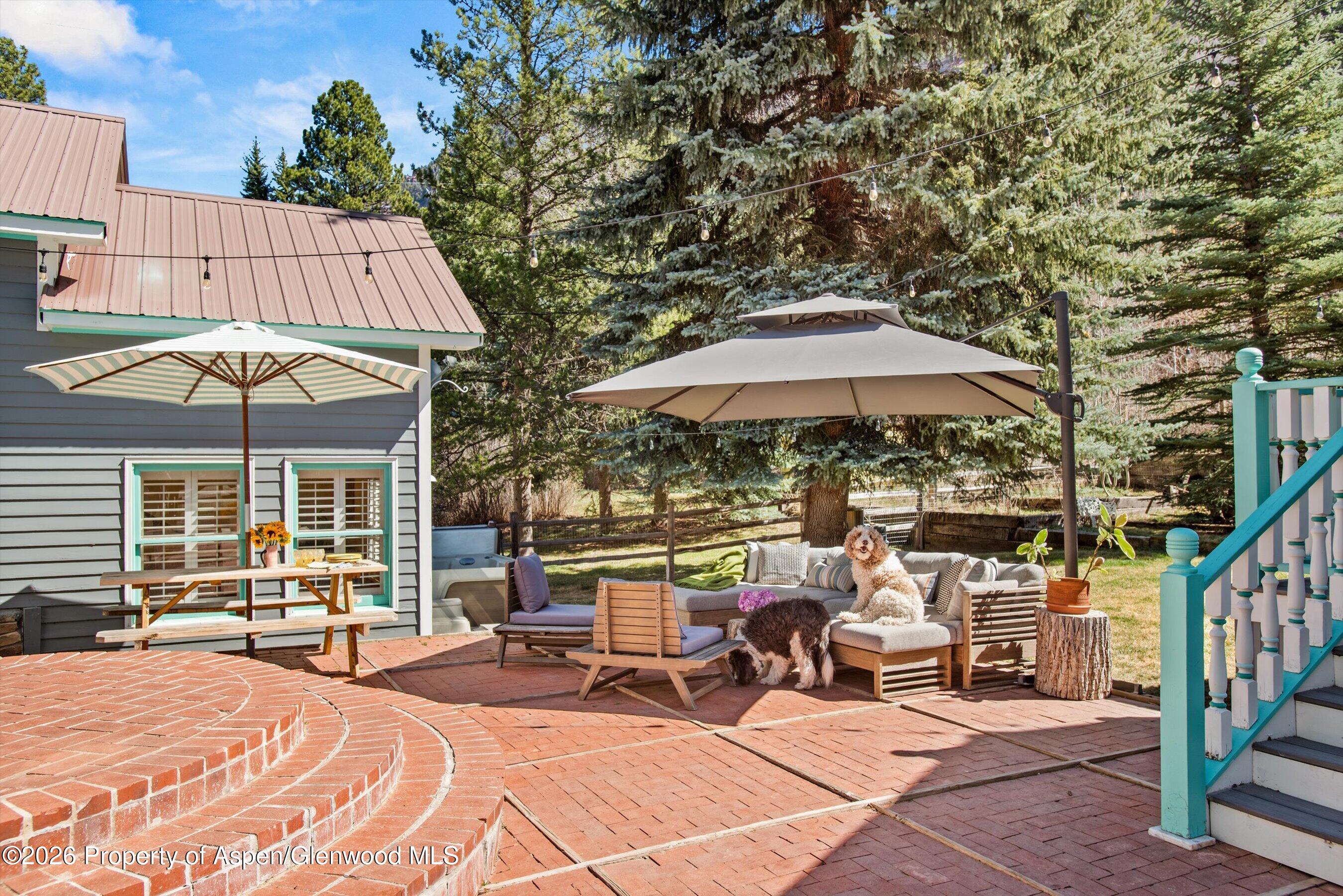 244 Redstone Boulevard Redstone, CO 81623 - Photo 5 of 55 a view of a house with backyard porch and sitting area