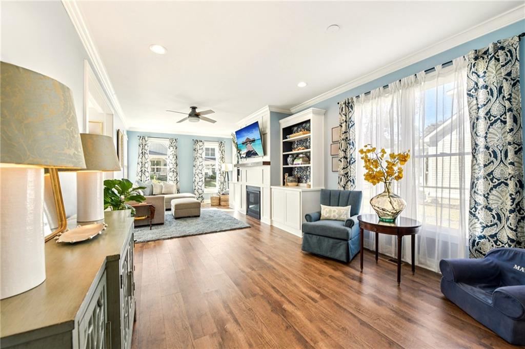 406 Bell Street Monroe, GA 30655 - Photo 17 of 60 a living room with furniture and a large window