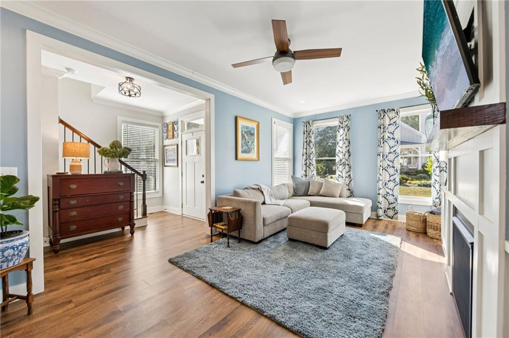 406 Bell Street Monroe, GA 30655 - Photo 21 of 60 a living room with furniture and a fireplace