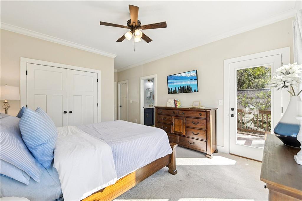 406 Bell Street Monroe, GA 30655 - Photo 28 of 60 a bedroom with a bed dresser and a window