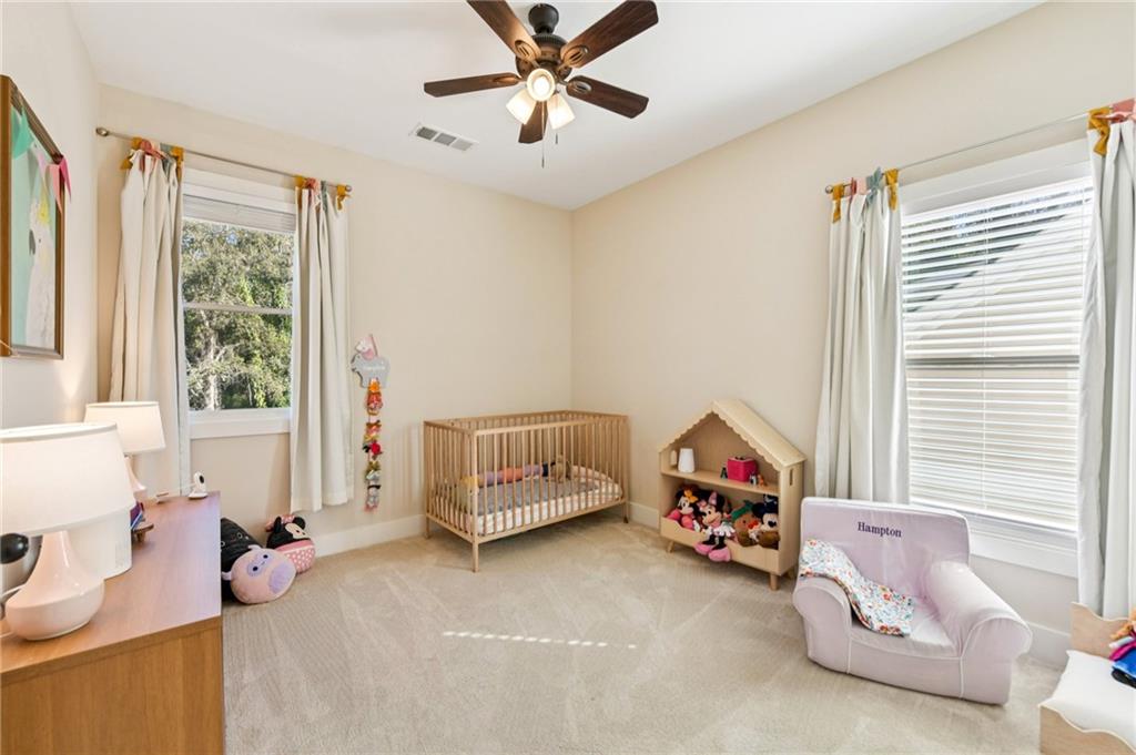 406 Bell Street Monroe, GA 30655 - Photo 34 of 60 a living room with furniture and a window
