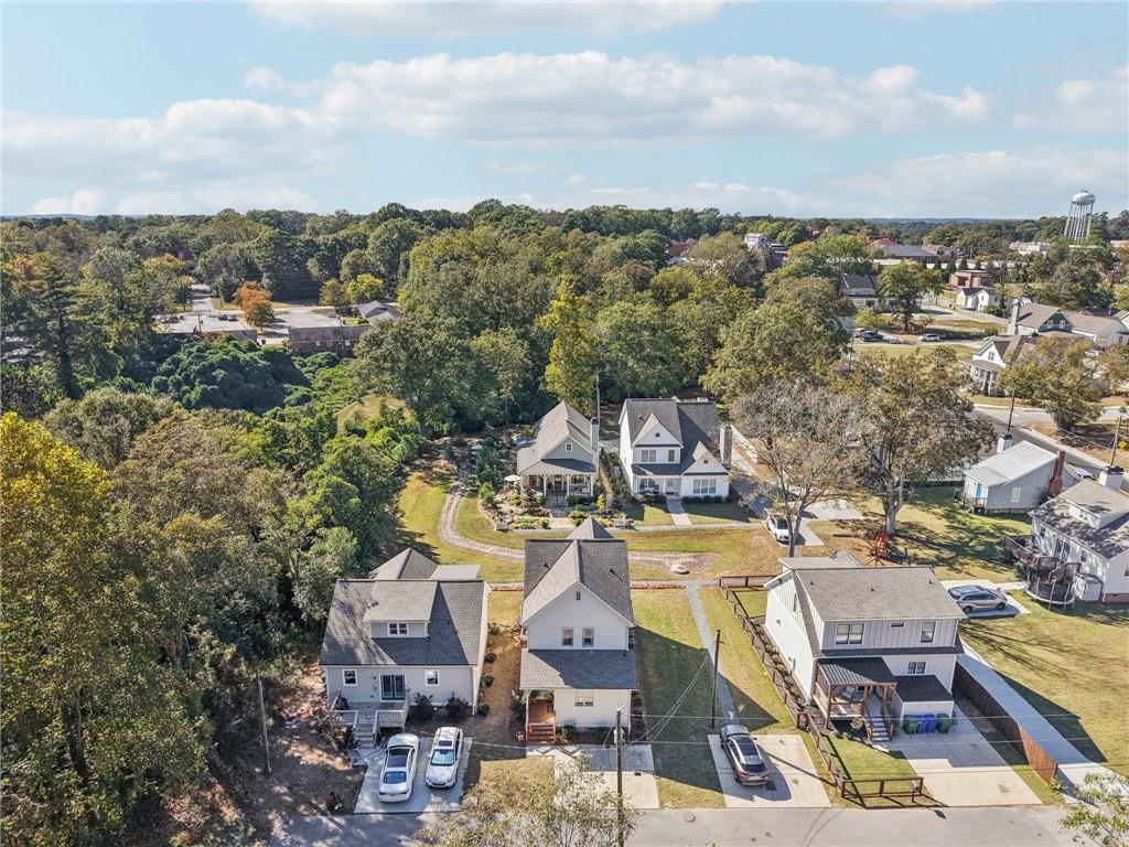 406 Bell Street Monroe, GA 30655 - Photo 48 of 60 a view of a city with lawn chairs