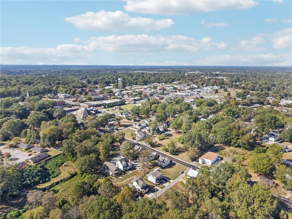 406 Bell Street Monroe, GA 30655 - Photo 50 of 60 an aerial view of a houses with city view