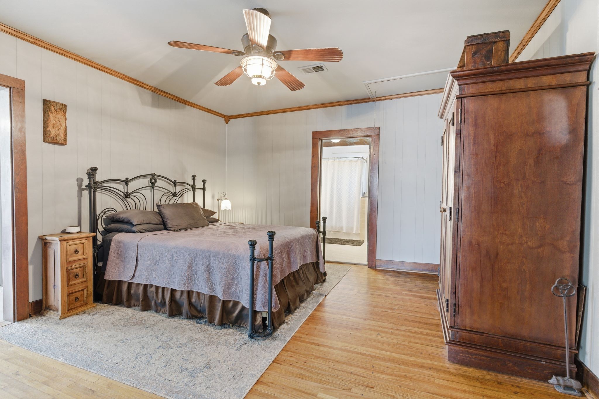 2667 Crocker Springs Road Goodlettsville, TN 37072 - Photo 22 of 64 a bedroom with a bed and a chandelier