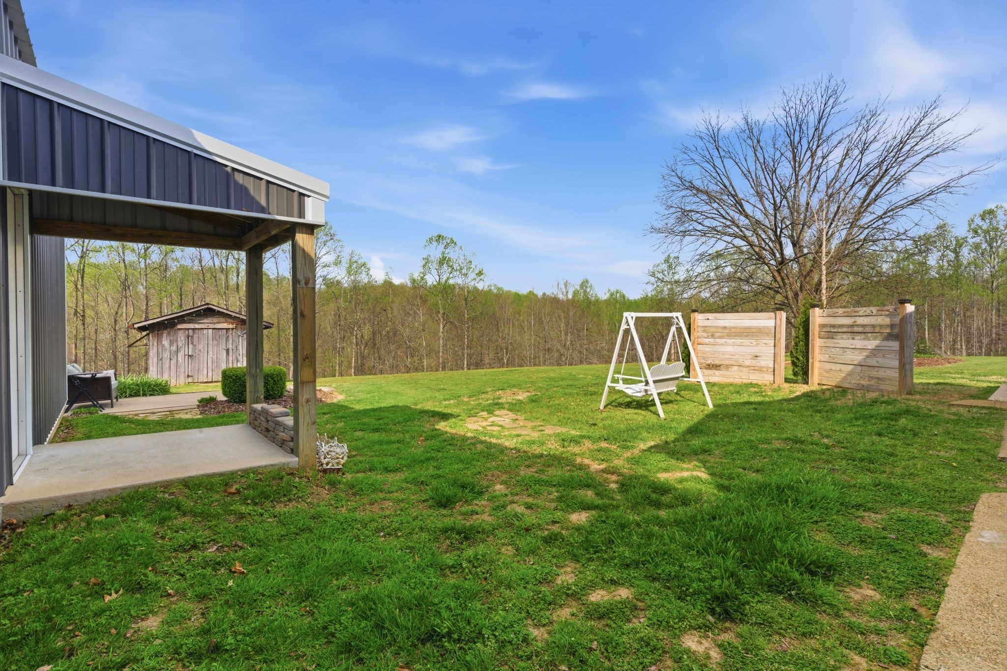 2667 Crocker Springs Road Goodlettsville, TN 37072 - Photo 33 of 64 a view of a backyard with a garden and entertaining space
