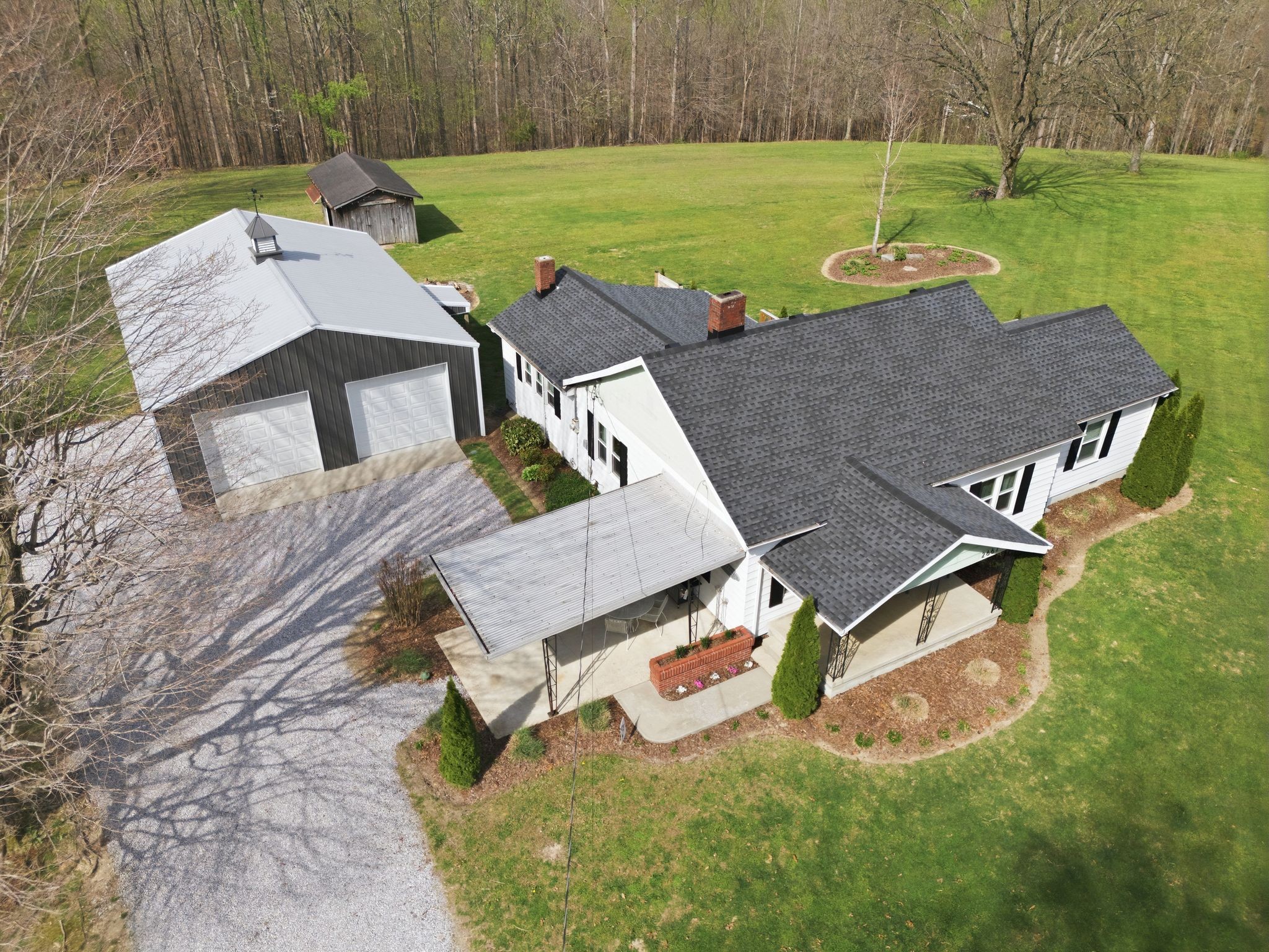 2667 Crocker Springs Road Goodlettsville, TN 37072 - Photo 59 of 64 an aerial view of a house with backyard space and a lake view
