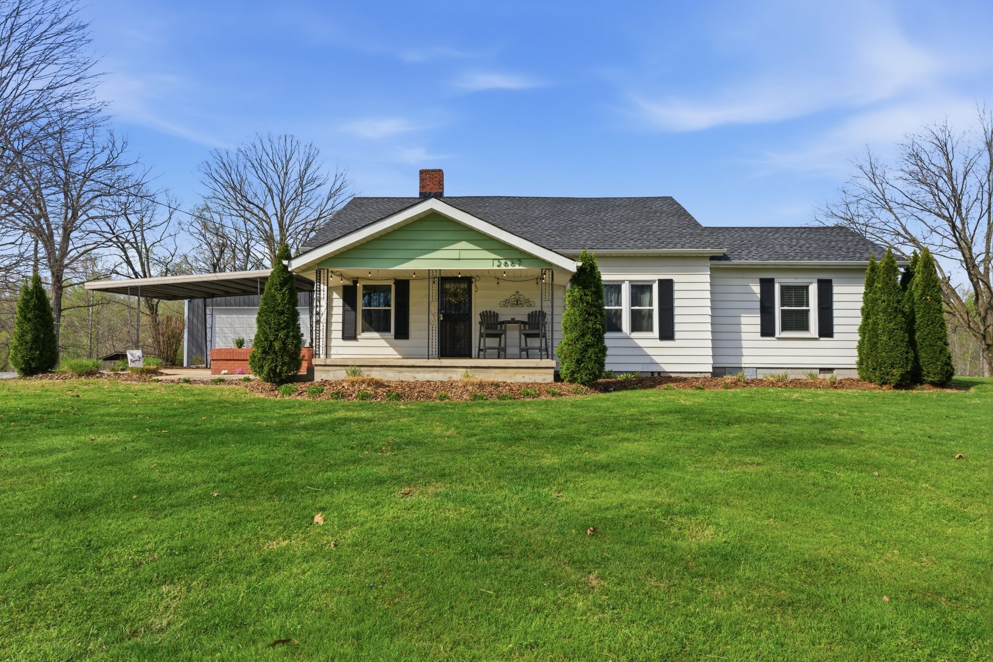 2667 Crocker Springs Road Goodlettsville, TN 37072 - Photo 62 of 64 a front view of a house with a garden