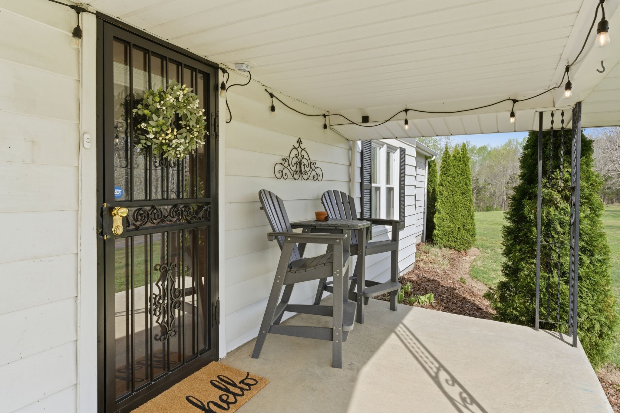 2667 Crocker Springs Road Goodlettsville, TN 37072 - Photo 10 of 64 a view of a porch with furniture and front door