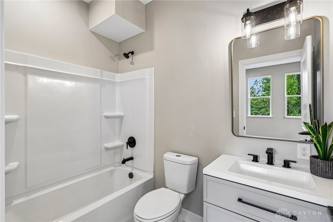 3906 Edwards Road, Unit C Cincinnati, OH 45209 - Photo 35 of 46 Modern bathroom featuring sleek fixtures and a practical tub-shower combination.