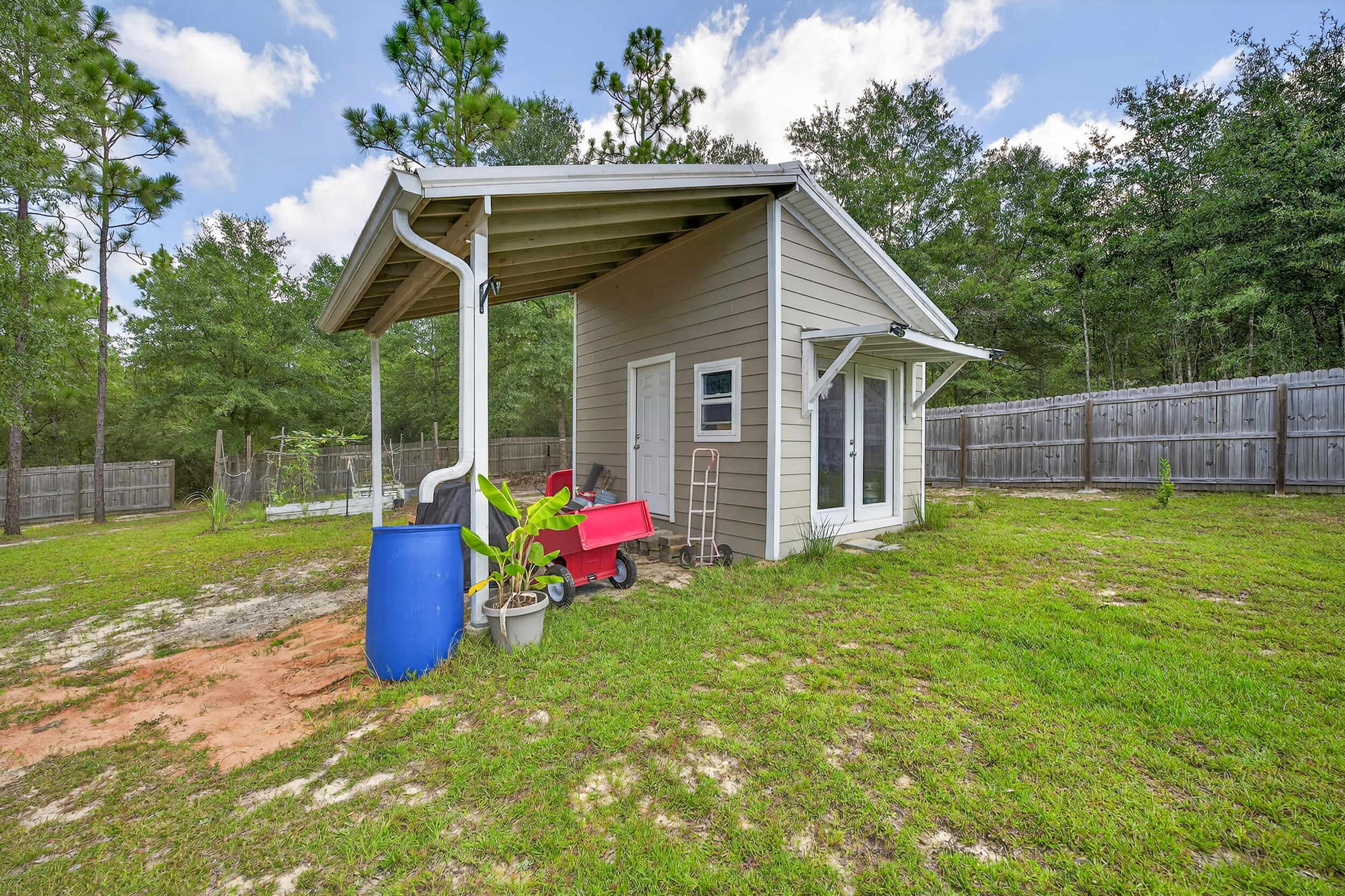 3113 Pinot Way Crestview, FL 32536 - Photo 40 of 50 Custom shed w/ rain gutters