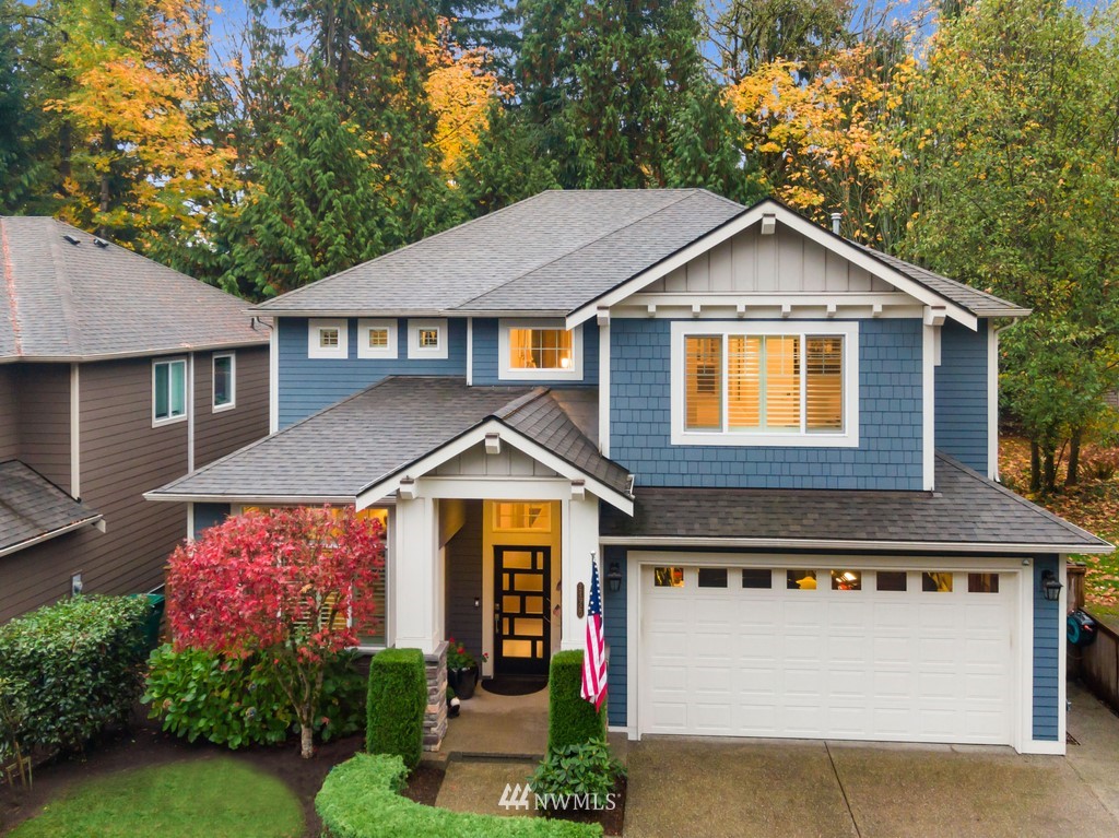 21920 37th Avenue Southeast Bothell, WA 98021 - Photo 2 of 39 a front view of a house with a yard