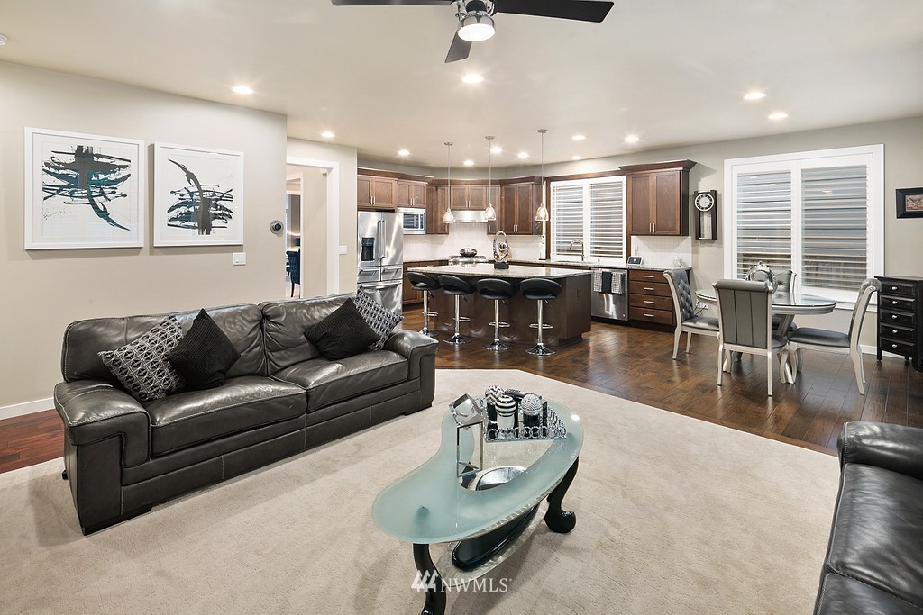 21920 37th Avenue Southeast Bothell, WA 98021 - Photo 18 of 39 a living room with furniture and kitchen view