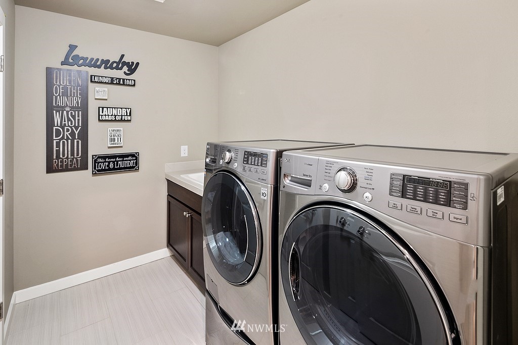 21920 37th Avenue Southeast Bothell, WA 98021 - Photo 29 of 39 a utility room with dryer and washer